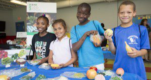 4H youth participate in a 4H Food Smart Families healthy food shopping workshop.  Photo taken 05/25/16.