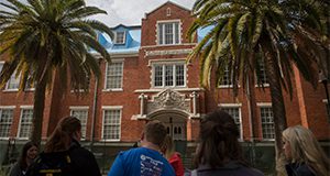 Students look at the College of Agriculture building.