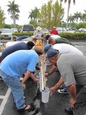 People checking nozzle output.