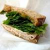 Turkey and leafy greens on whole-grain bread with chutney.