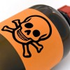 A bottle labeled with a skull and crossbones.