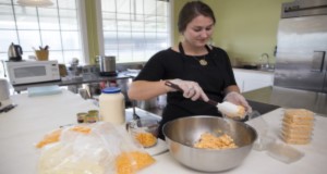 Cottage food preparation at the communal kitchen at Fifth Generation Farms in Lake City, Florida.  Photo Credits:  UF/IFAS Photo by Tyler Jones