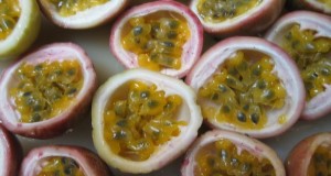 Passion fruit cross section, showing juice-filled arils and black seeds. Credits: Mark Bailey, UF/IFAS