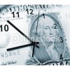 A dollar bill with a clock face over it.