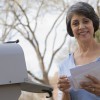 A woman checking her mail.