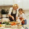 picture of a young woman and her daughter (10-12) preparing a thanksgiving meal