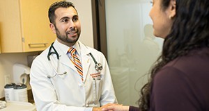 Image of Rahim Remtulla working at the Hillman Cancer Center in Pittsburgh for the CALS lookbook project.