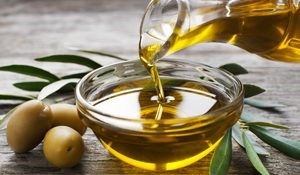 Olive oil being poured into a glass bowl. istock photo: 58497852 Copyright: dulezidar.