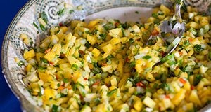 A bowl of freshly prepared mango salsa. 