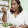 A woman eating a salad