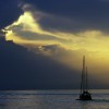 A sailboat in the ocean after a storm
