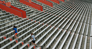 Students running in the Ben Hill Griffin Stadium at the University of Florida, exercise, bleachers, fitness. UF/IFAS Photo: Sally Lanigan.