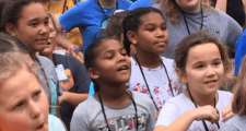 Children at a 4-H event with all different facial expressions.
