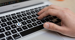 Hand on a computer keyboard. Photo taken 10-27-21. UF/IFAS Photo by Tyler Jones.