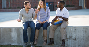 Students on UF's campus talking outside of the Reitz Union. Photo taken on 01-05-17. UF/IFAS Photo by Camila Guillen.