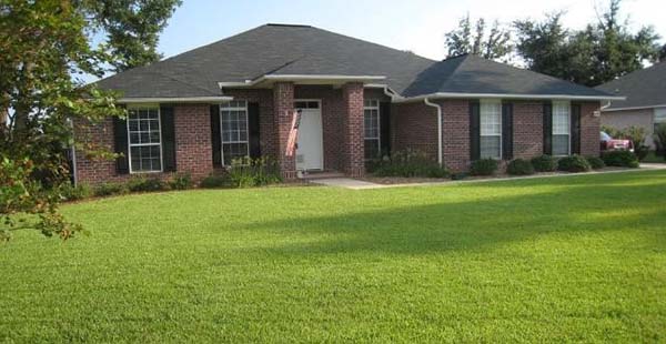 Home with a centipedegrass lawn.